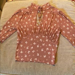 Medium brown Free People top.